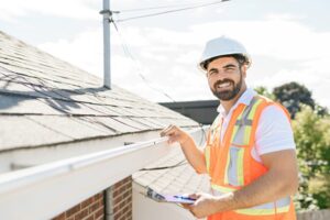 Roofing expert holding a clipboard ready for roof installation service in San Jose, California